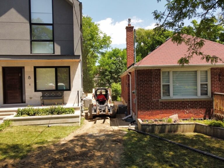 Modern backyard with a cozy seating area and garden elements