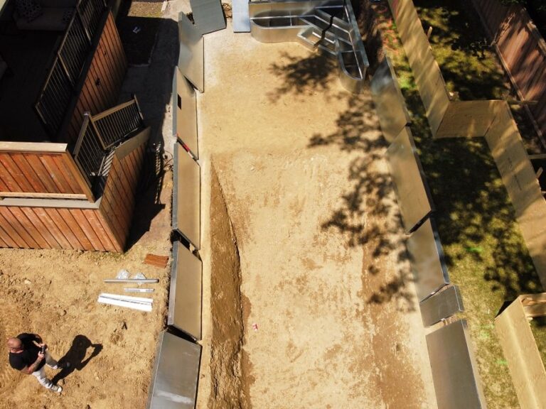 Elegant backyard with a pergola and decorative garden