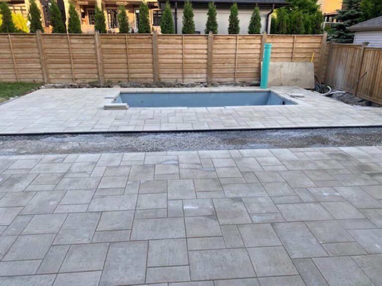 Elegant outdoor space with a mix of lawn and garden beds