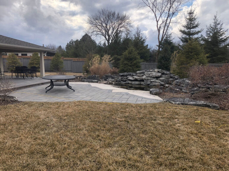 Before image of a backyard renovation project