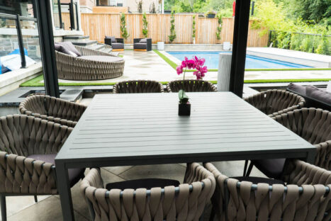 Backyard garden with lush greenery and stone accents