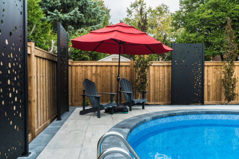 Backyard design featuring a mix of stone and wooden elements