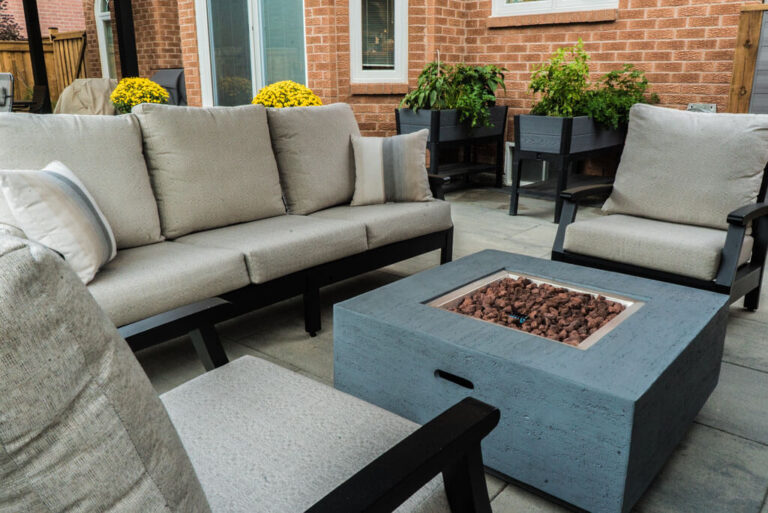 Modern backyard design with a mix of greenery and stone elements