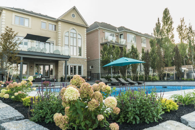 Contemporary patio with a mix of stone and wood elements