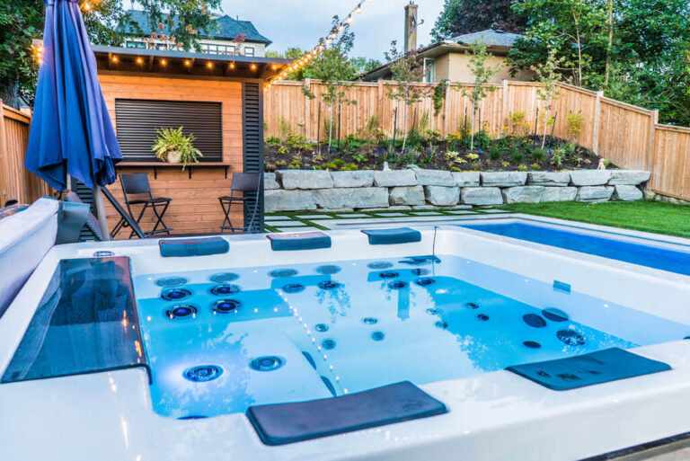 Backyard pool area with modern landscaping