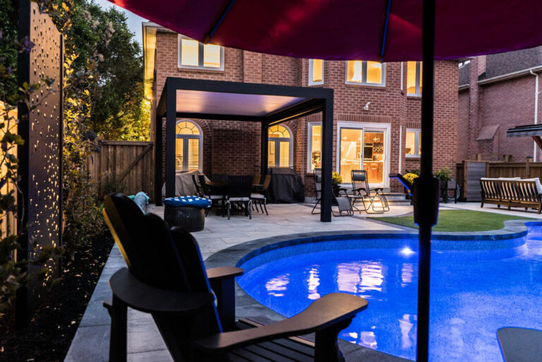 Completed landscape project with paved walkway and greenery