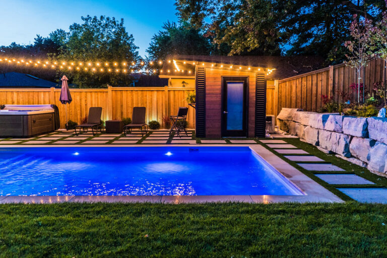 Completed outdoor living area with seating and fire pit