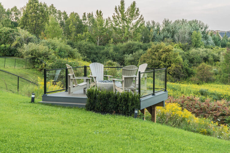 Well-designed garden pathway with plants and outdoor lighting