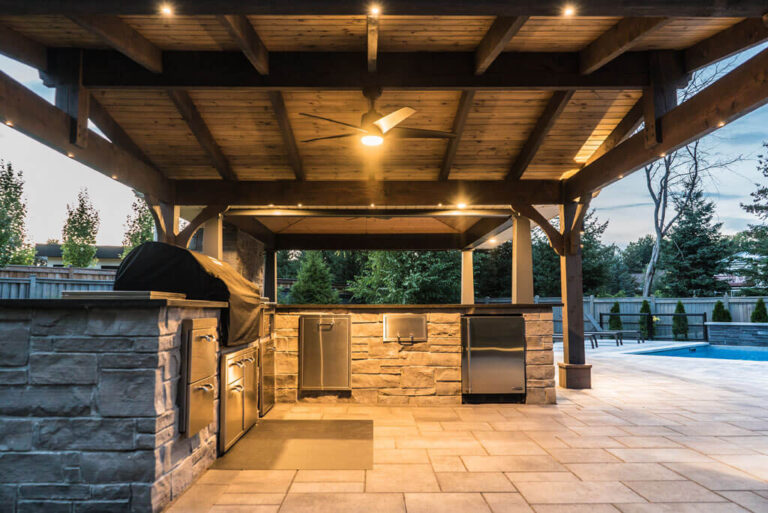 Modern backyard with wooden deck and comfortable outdoor furniture