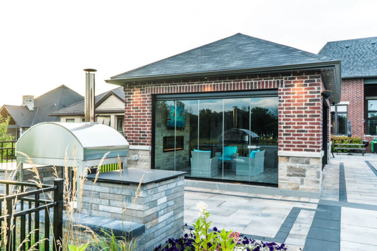 Backyard with Green Lawn and Stone Walkway