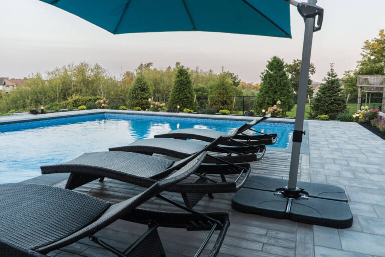 Spacious outdoor patio with a pergola and dining area