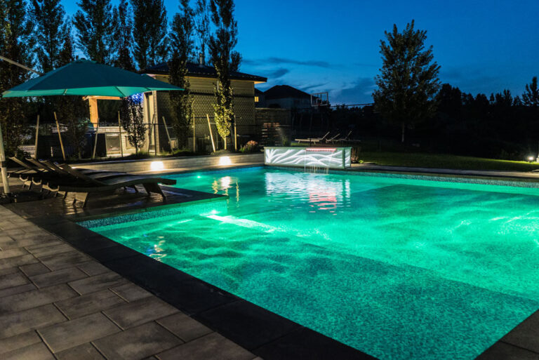 Elegant backyard with a blend of stone and greenery elements