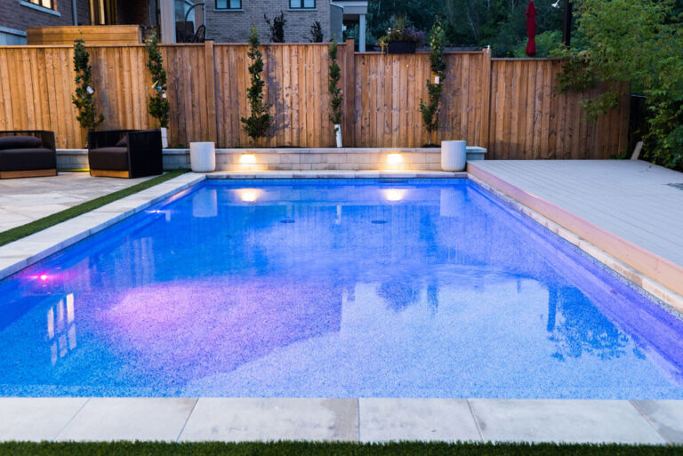 Outdoor dining area with pergola and modern furniture