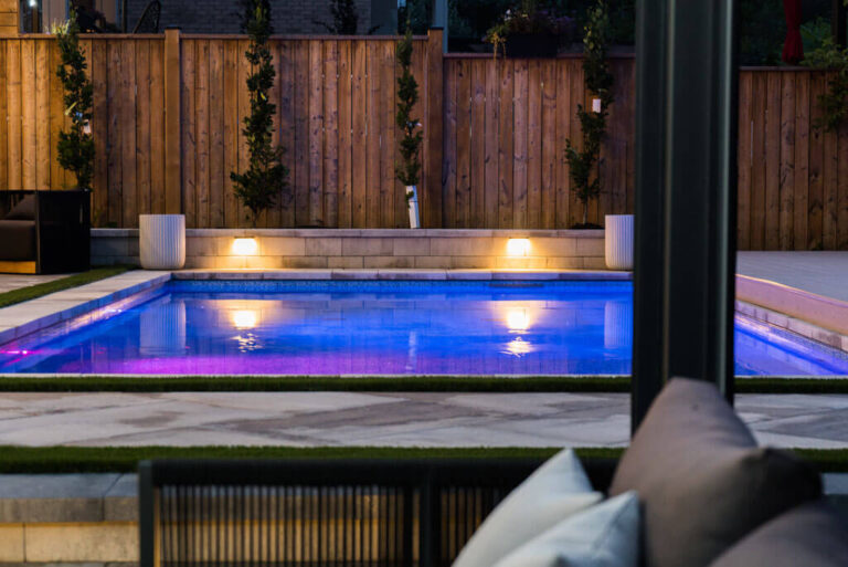 Stone patio with outdoor dining set and pergola