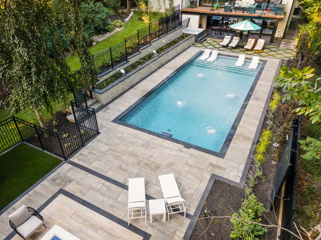 Backyard Pool Landscaping Design Considerations for Retaining Walls