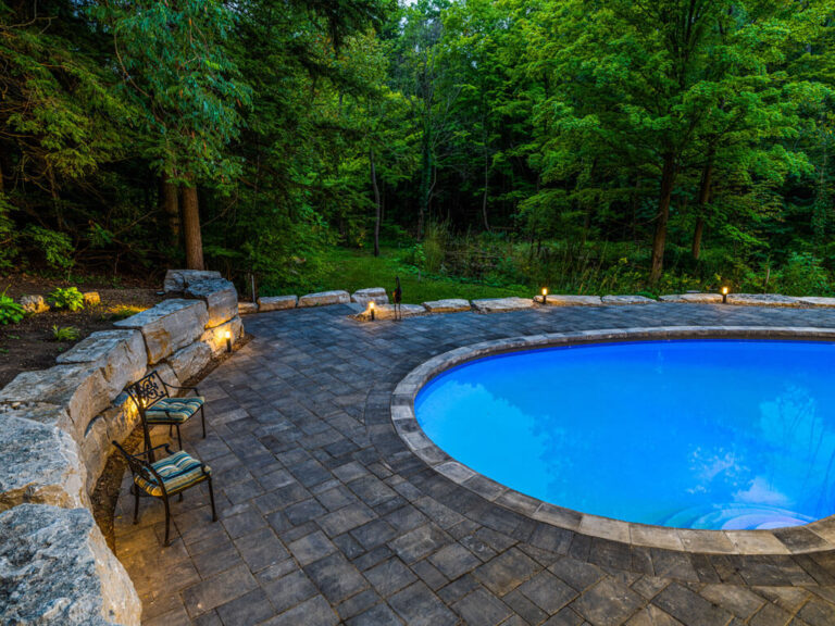 Well-constructed Indian road with greenery on both sides